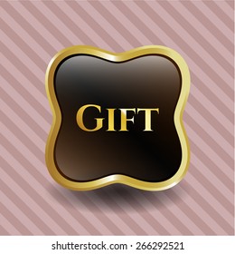 Gold emblem with text "Gift" inside