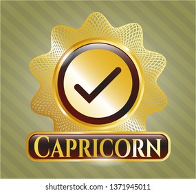  Gold emblem with tick icon and Capricorn text inside