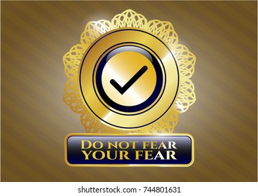  Gold emblem with tick icon and Do not fear your fear text inside