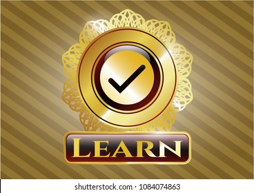  Gold emblem with tick icon and Learn text inside