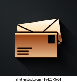 Gold Envelope icon isolated on black background. Email message letter symbol. Long shadow style. Vector Illustration