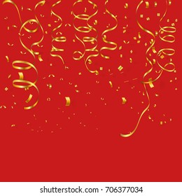 gold festive party popper with gold confetti on red background
