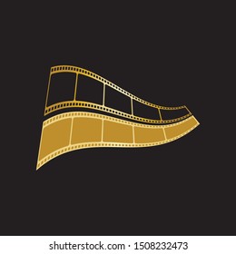 gold film strip isolated on black background.