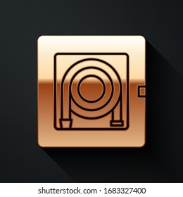 Gold Fire hose cabinet icon isolated on black background. Long shadow style. Vector Illustration