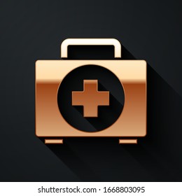 Gold-Verbandskasten-Symbol einzeln auf schwarzem Hintergrund. Medizinische Box mit Kreuz. Medizinische Ausrüstung für Notfälle. Konzept der Gesundheitsversorgung. Lange Schattenstil. Vektorillustration-Illustration