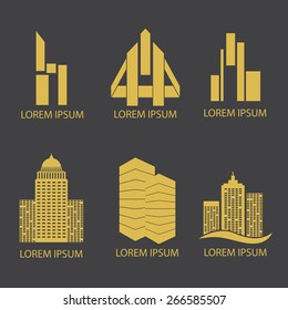 Gold flat logo on dark grey background for real estate business.