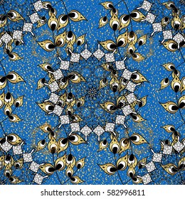 Gold floral ornament in baroque style. Golden element on blue background. Gold Wallpaper on texture background. Damask repeating background.