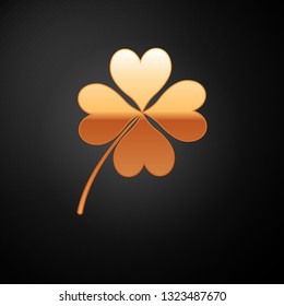 Gold Four leaf clover icon isolated on black background. Happy Saint Patrick day. Vector Illustration