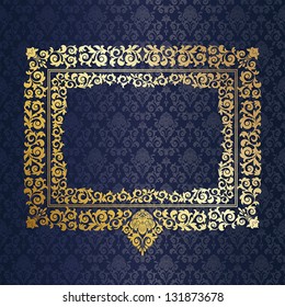 Gold frame on the wall with blue wallpaper