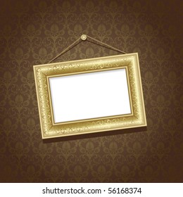 Gold frame on the  wall with brown wallpaper