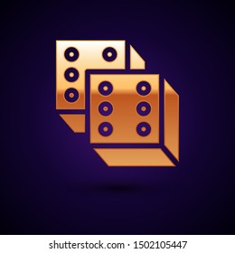 Gold Game dice icon isolated on dark blue background. Casino gambling.  Vector Illustration