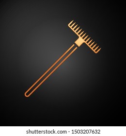 Gold Garden rake icon isolated on black background. Tool for horticulture, agriculture, farming. Ground cultivator. Housekeeping equipment.  Vector Illustration