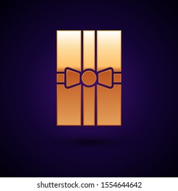 Gold Gift box icon isolated on dark blue background. Merry Christmas and Happy New Year.  Vector Illustration