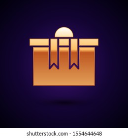Gold Gift box icon isolated on dark blue background. Merry Christmas and Happy New Year.  Vector Illustration
