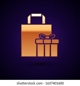 Gold Gift box icon isolated on dark blue background.  Vector Illustration