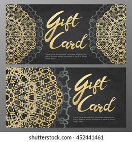 Gold gift certificates in the Arabic style. Gift Card with mandalas. Grey and gold. Vector illustration
