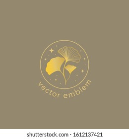 Gold ginkgo leaf vector logo design template