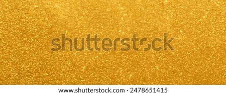 Gold glitter background. Luxurious sparkling backdrop for festive occasions like wedding, birthday, award ceremony. Elegant luxury golden banner. Premium shiny backdrop. Yellow color shimmer wallpaper