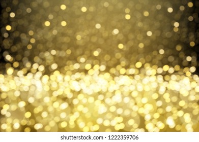 Gold glitter effect. Sparkling falling particles abstract luxury background 