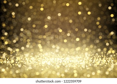 Gold glitter effect. Sparkling falling particles abstract luxury background 