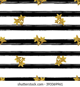 Gold glitter flowers seamless pattern  with striped brush stroke background. 