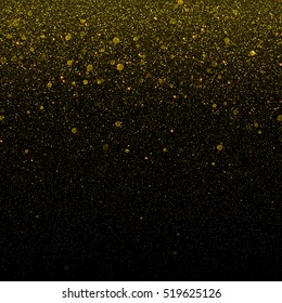 Gold glitter particles background. Falling golden glittering snow effect for luxury Christmas and New Year greeting card. Sparkling texture. Star dust sparks in explosion on black background.