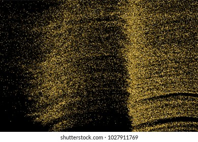 Gold glitter texture isolated on black. Amber particles color. Celebratory background. Golden explosion of confetti.