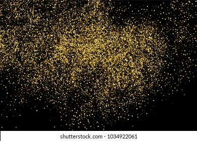 Gold glitter texture isolated on black. Amber particles color. Celebratory background. Golden explosion of confetti.