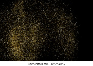 Gold glitter texture isolated on black. Amber particles color. Celebratory background. Golden explosion of confetti.