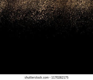 Gold glitter texture isolated on black background. Golden explosion of confetti. Holiday background. 