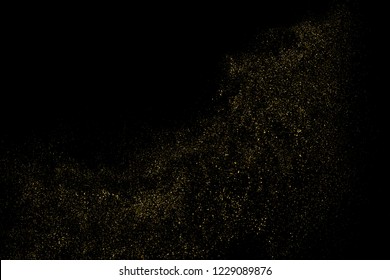 Gold Glitter Textur einzeln auf Schwarz. Farbe der gelben Partikel. Feierlicher Hintergrund. Goldene Explosion von Confetti. Design-Element. Vektorgrafik, EPS10.