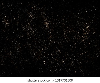 Gold glitter texture isolated on black background. Golden explosion of confetti. Holiday background. 