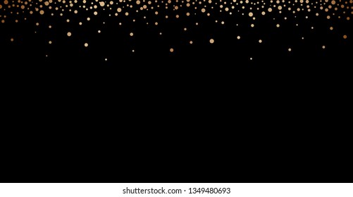 Gold glitter texture isolated on black background. Golden explosion of confetti. Holiday background. 
