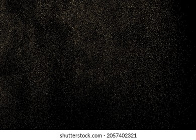 Gold Glitter Textur einzeln auf schwarzem Hintergrund. Goldener Sternenstaub. Farbe der gelben Partikel. Funkeln regnen. Vektorgrafik, EPS10.
