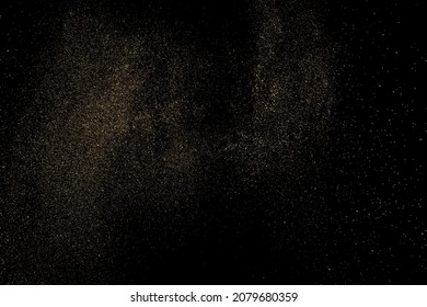 Gold Glitter Textur einzeln auf schwarzem Hintergrund. Goldener Sternenstaub. Farbe der gelben Partikel. Funkeln regnen. Vektorgrafik, EPS10.