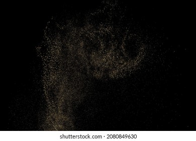 Gold Glitter Texture Isolated on Black Background. Golden stardust. Amber Particles Color. Sparkles Rain. Vector Illustration, Eps 10.
