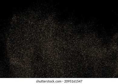 Gold Glitter Texture Isolated on Black Background. Golden stardust. Amber Particles Color. Sparkles Rain. Vector Illustration, Eps 10.