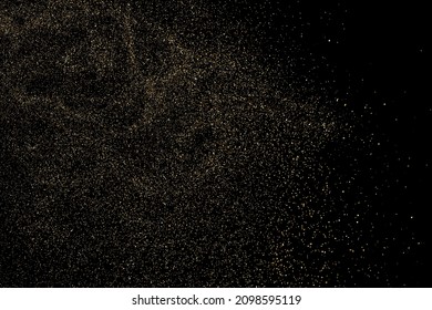 Gold Glitter Texture Isolated on Black Background. Golden stardust. Amber Particles Color. Sparkles Rain. Vector Illustration, Eps 10.