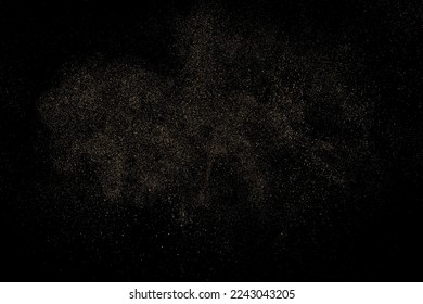 Gold Glitter Texture Isolated on Black Background. Golden stardust. Amber Particles Color. Sparkles Rain. Vector Illustration, Eps 10.