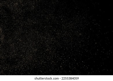 Gold Glitter Texture Isolated on Black Background. Golden stardust. Amber Particles Color. Sparkles Rain. Vector Illustration, Eps 10.