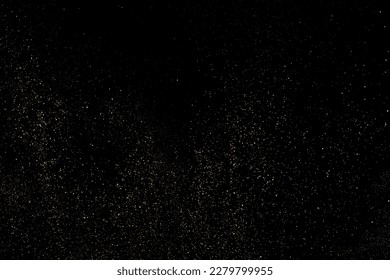 Gold Glitter Texture Isolated on Black Background. Golden stardust. Amber Particles Color. Sparkles Rain. Vector Illustration, Eps 10.