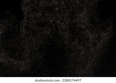 Gold Glitter Texture Isolated on Black Background. Golden stardust. Amber Particles Color. Sparkles Rain. Vector Illustration, Eps 10.