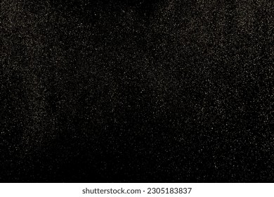 Gold Glitter Texture Isolated on Black Background. Golden stardust. Amber Particles Color. Sparkles Rain. Vector Illustration, Eps 10.