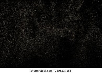 Gold Glitter Texture Isolated on Black Background. Golden stardust. Amber Particles Color. Sparkles Rain. Vector Illustration, Eps 10.