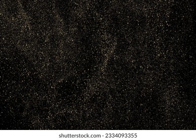 Gold Glitter Texture Isolated on Black Background. Golden stardust. Amber Particles Color. Sparkles Rain. Vector Illustration, Eps 10.