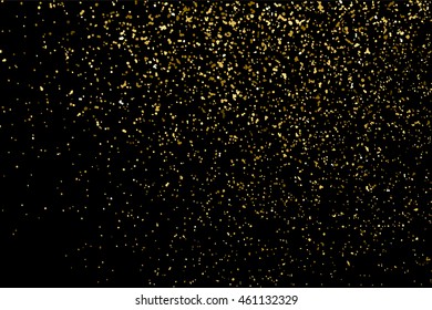 Gold glitter texture isolated on black. Celebratory background. Golden explosion of confetti. Vector illustration,eps 10.