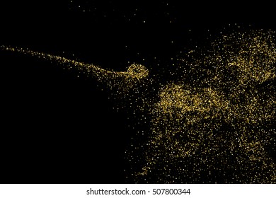 Gold glitter texture isolated on black. Celebratory background. Golden explosion of confetti. Vector illustration,eps 10.