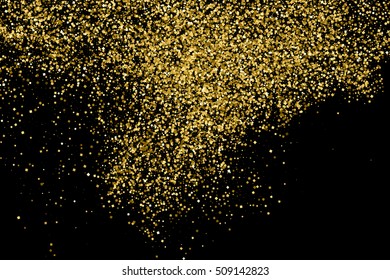 Gold glitter texture isolated on black. Celebratory background. Golden explosion of confetti. Vector illustration,eps 10.