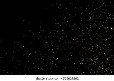 Gold glitter texture isolated on black. Amber particles color. Celebratory background. Golden explosion of confetti. Vector illustration,eps 10.