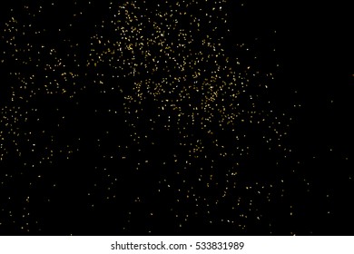 Gold glitter texture isolated on black. Amber particles color. Celebratory background. Golden explosion of confetti. Vector illustration,eps 10.
